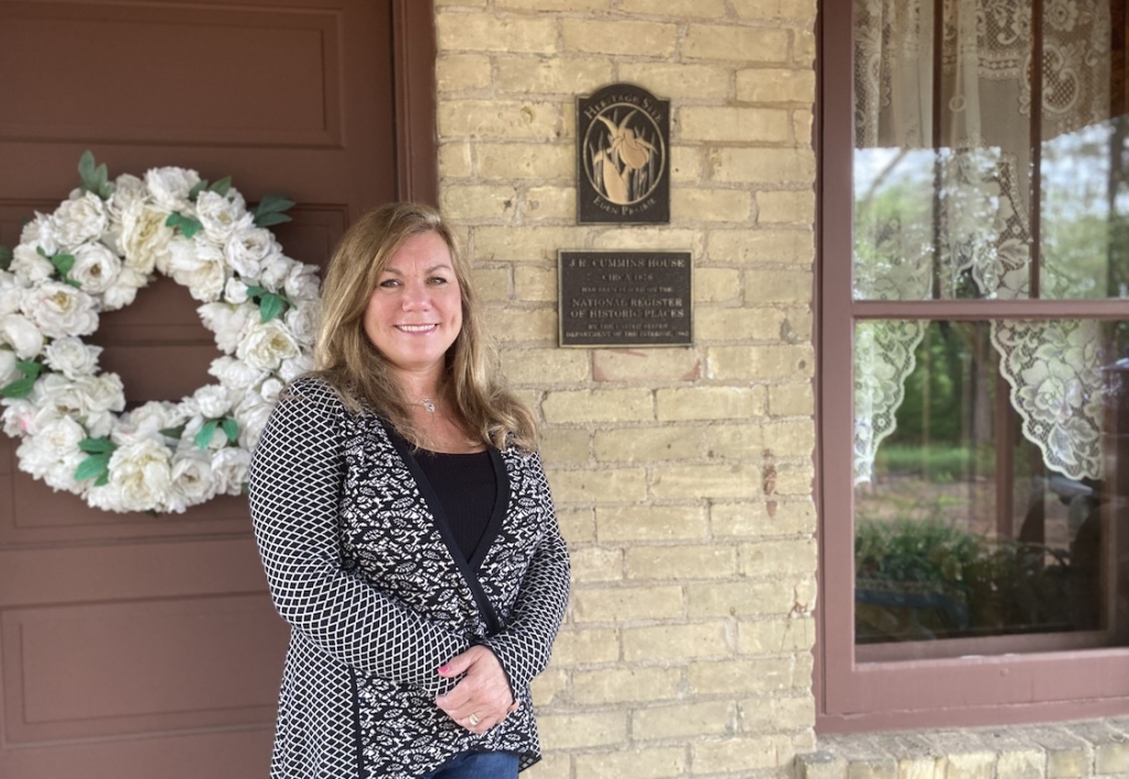 Katie Qualey stands outside the Cummins-Phipps-Grill House. Photos by Stuart Sudak