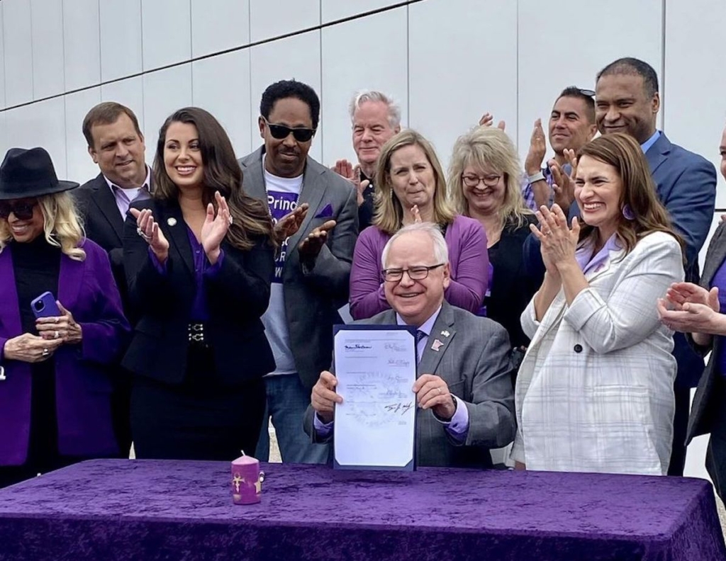 Gov. Tim Walz signed a bill Tuesday at Paisley Park in Chanhassen to rename a seven-mile stretch of Highway 5 as the Prince Rogers Nelson Memorial Highway. Photo courtesy of Sen. Coleman
