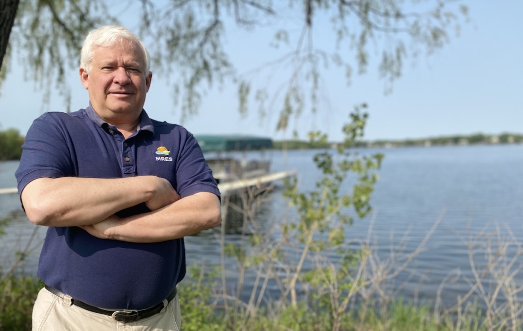 Mark Weber, president of the Minnesota Renewable Energy Society, at Riley Lake Park, the location of the Solar Boat Regatta scheduled for Saturday. Photo by Stuart Sudak