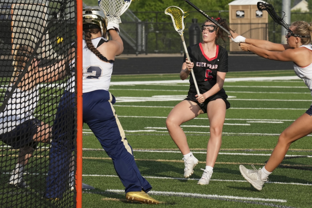 Eagles senior attacker-midfielder Brinley Hopper (5) shown in action on the field. She scored seven goals and contributed two assists during the team's 16-15 loss to Chanhassen. Photo by Rick Olson.