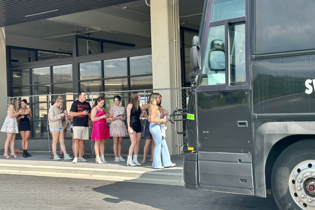 Fans line-up outside SouthWest Station in Eden Prairie to catch a ride to US Bank Stadium for the Taylor Swift Eras Tour 