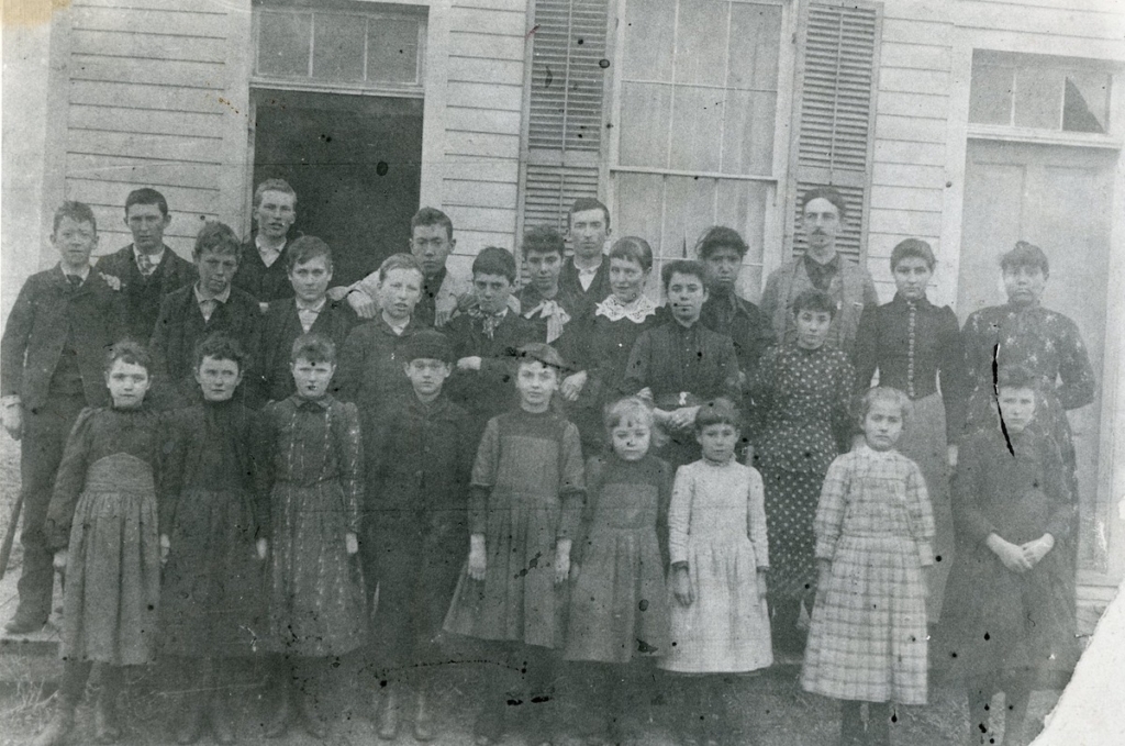 Eden Prairie Historical Society black of white photo of the Gould School. It depicts students of the 1891 standing in front of the school