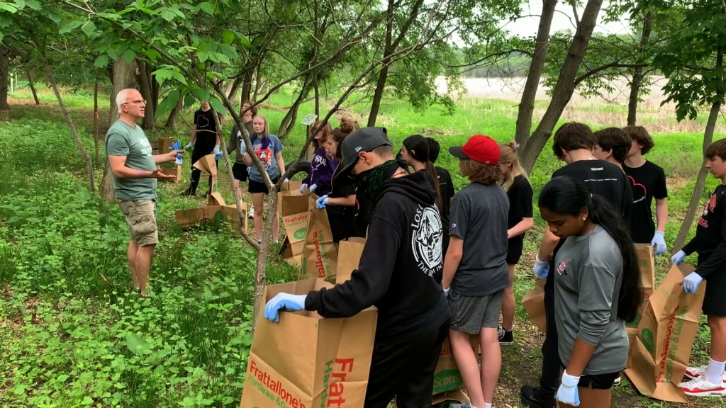 John LeBlanc on Friday June 2 garlic mustard pull with Central Middle School students.