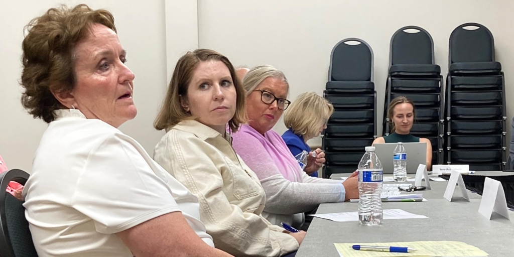 Cindy Eddy (left), executive director of The PROP Shop, and other local nonprofit leaders met with city staff and the Eden Prairie City Council on Sept. 5 to share information on EP residents' social-service needs. Photo by Mark Weber
