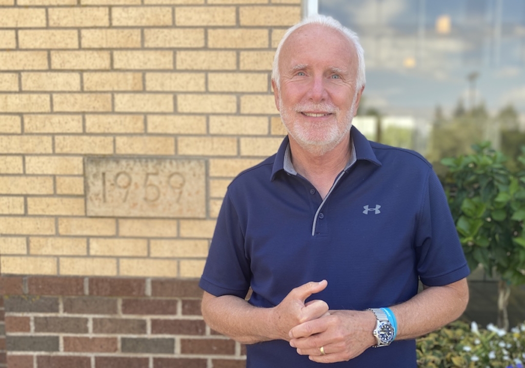 Mike Flavin stands outside Prairie Community Church in Eden Prairie in August 2023.