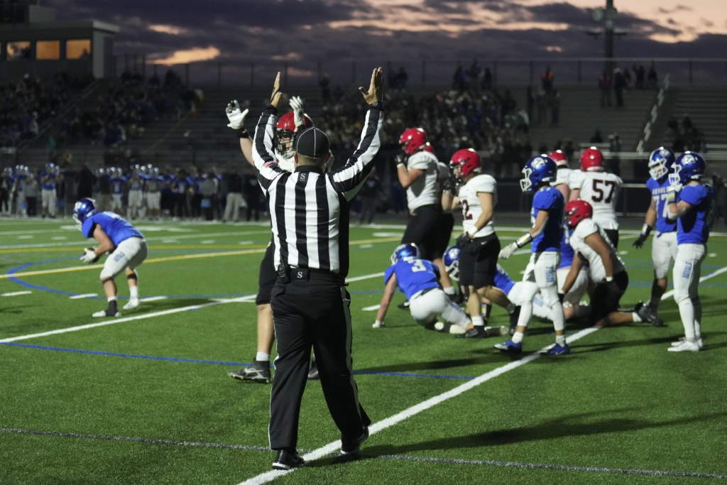 The referee signals junior Jeremy Frederick's second-quarter touchdown in the Eagles 29-22 win over Woodbury on Thursday. Photo by Rick Olson