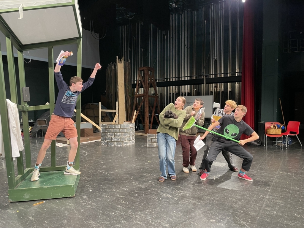 Rehearsals: (L-R) Owen Caruth as Oz, Laura Schiveley as Dorothy (with Diva as Toto), Zak Bhatti as the Lion, Mark Allen as the Tin Man, and Adam Szendre as the Scarecrow. Photo by Laurie Nebeker

