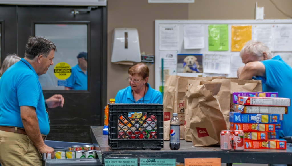 PROP volunteers sort and package food donations. Photo courtesy of PROP Food