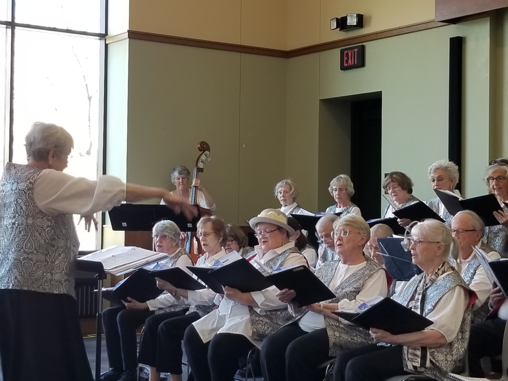 Senior women singing in a choir