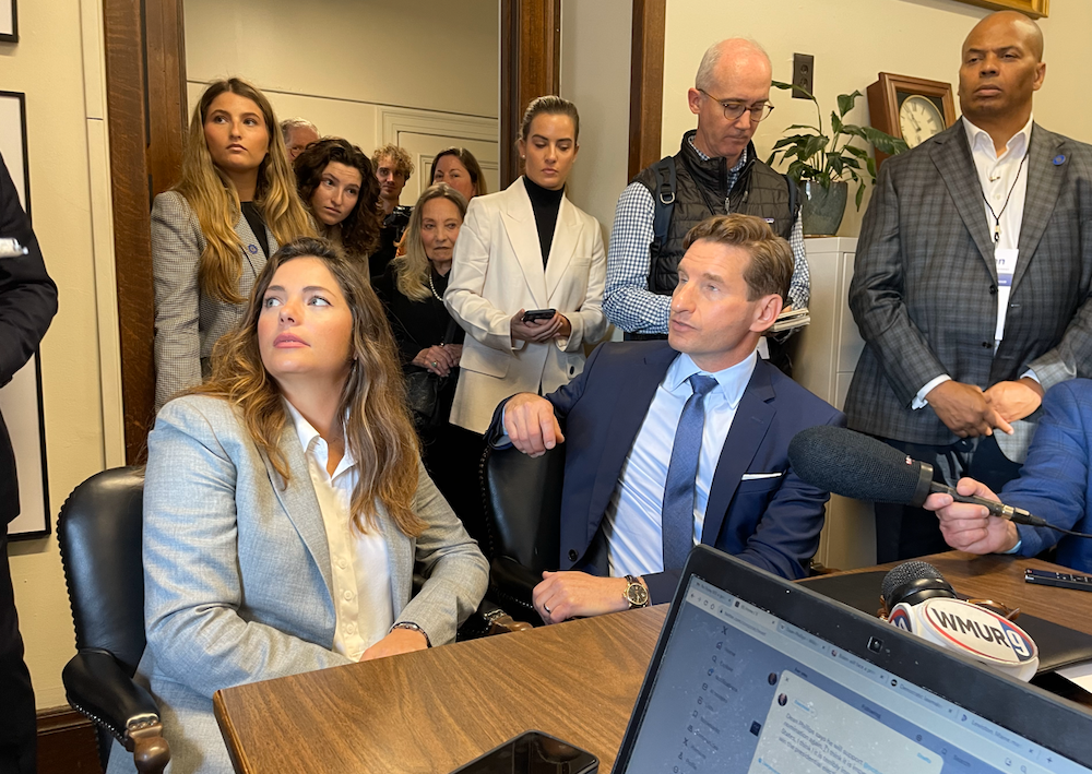U.S. Rep. Dean Phillips and his wife, Annalise Glick, answer questions at the Secretary of State’s office in the State House in Concord after he filed as a Democratic candidate for the first-in-the-nation presidential primary in October. Paula Tracy photo