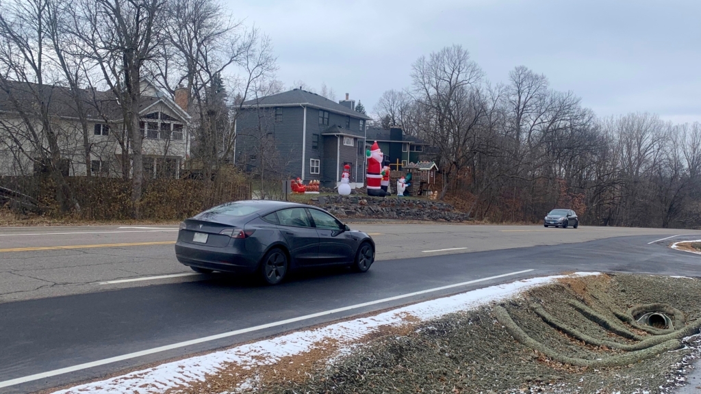 Holiday cheer leaders along Eden Prairie Road near Duck Lake Trail.