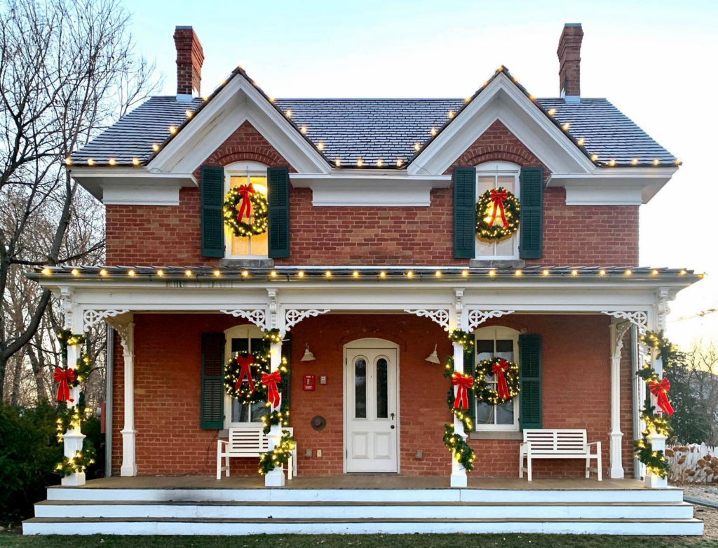 Smith Coffee decked out with holiday greenery and white lights lining the roofline.