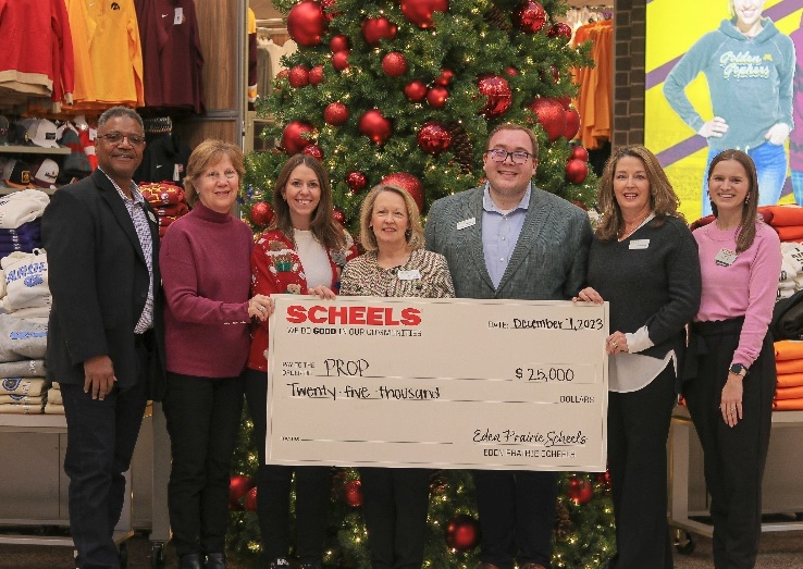 From left, PROP Board Chair Erik Miles, Vice Chair Kim Larish, Scheels' Lauren Andrist, PROP Executive Director Jenifer Loon, Development Director Matt Dymoke, and Scheels' Kourtney Misialek. Photo by Tyler Brandel/Scheels.
