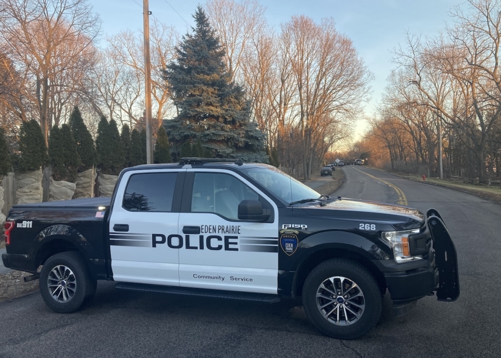 An Eden Prairie police vehicle was stationed on Riverview Road, facing east from Landing Drive, at about 5 p.m. on Wednesday. Photo by Steve Schewe