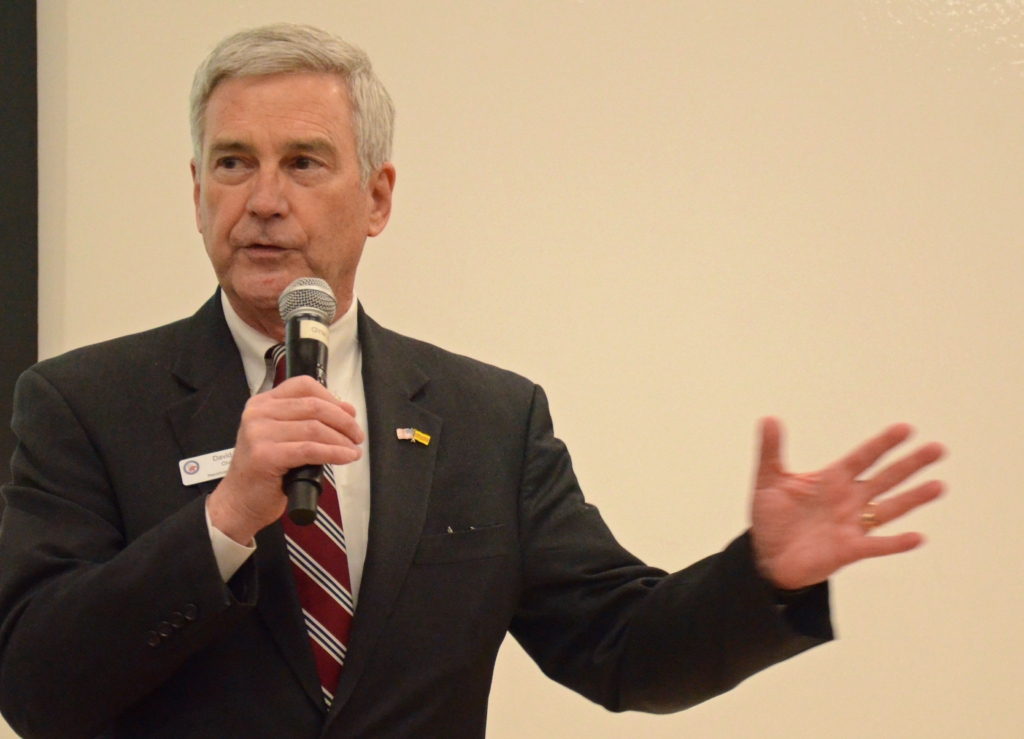 Minnesota Republican Party Chairman David Hann spoke to the Senate District 49 Caucus members Feb. 27 at Central Middle School. Photo by Jim Bayer
