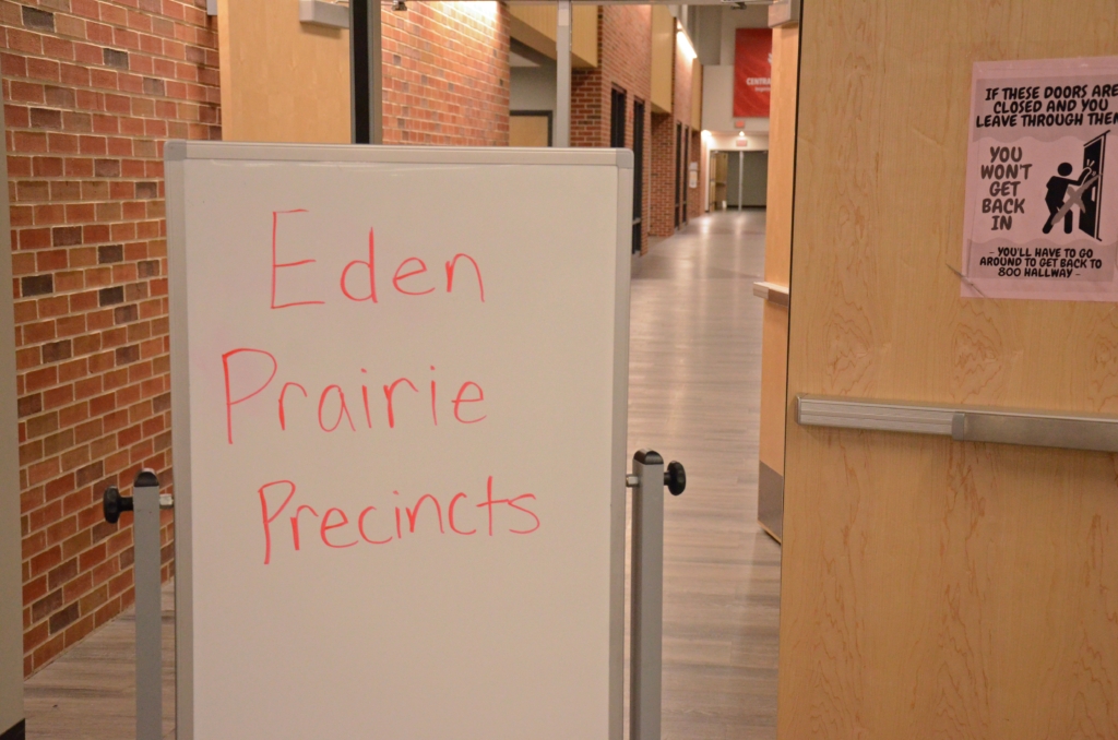 A sign directs Eden Prairie residents to where their precincts are meeting during the Senate District 49 Republican Caucus at Central Middle School on Tuesday. Photos by Jim Bayer