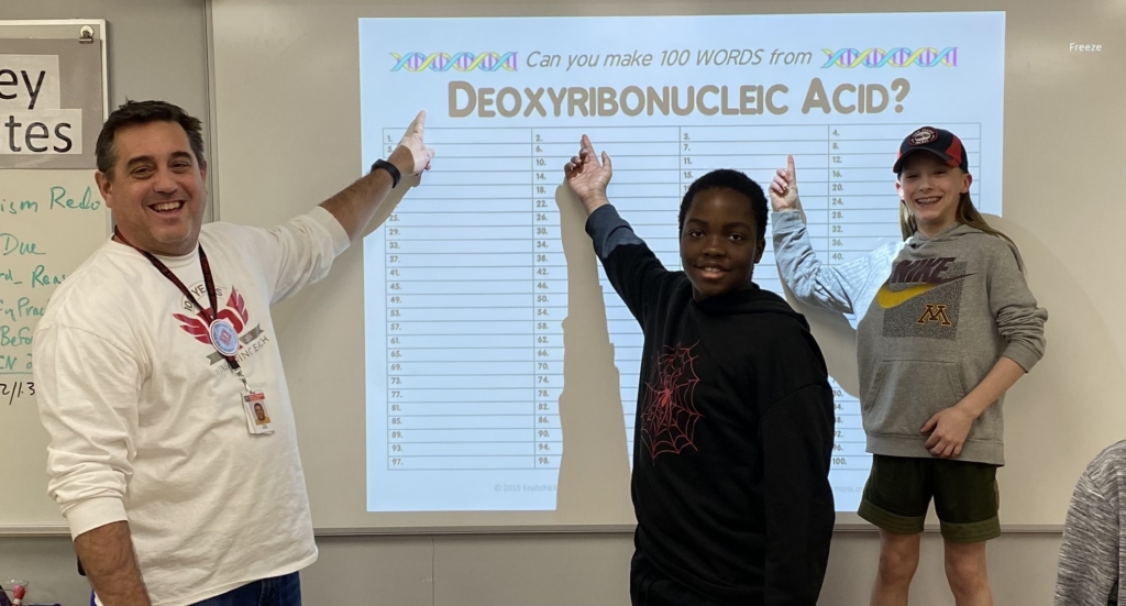 CMS science teacher Doug Welch with two of his students, Aziz and Dane. Photo by Juliana Allen