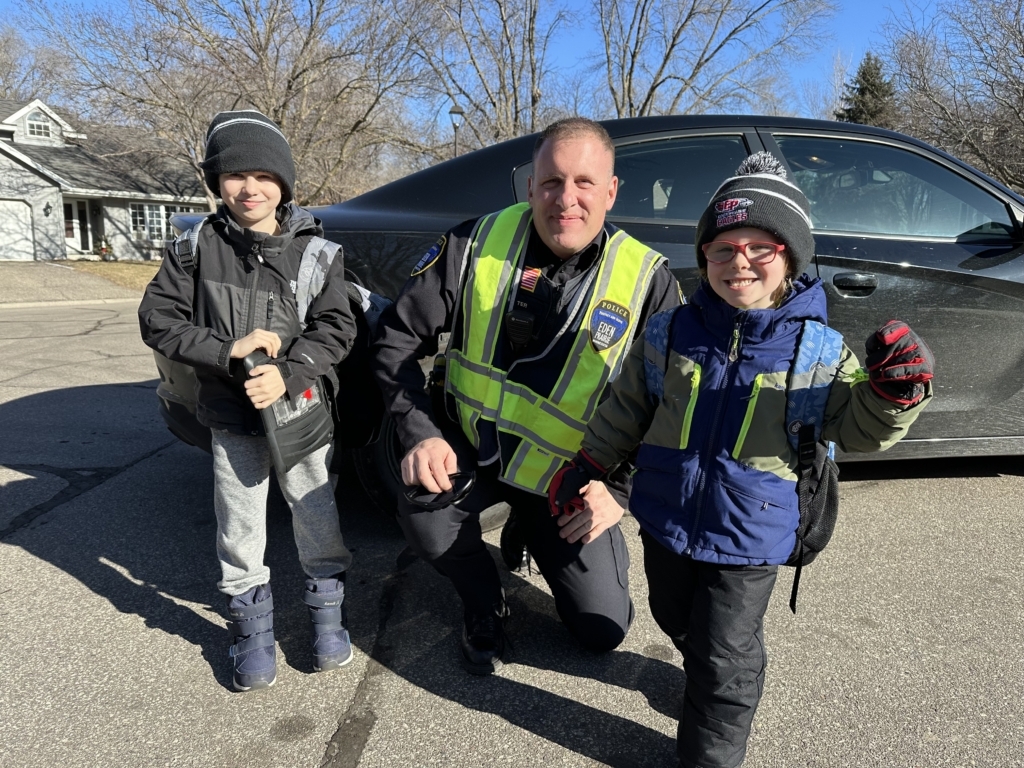 From left) William Collett, Lt. Jess Irmiter, and Jack Collett. Photo by Rob Collett