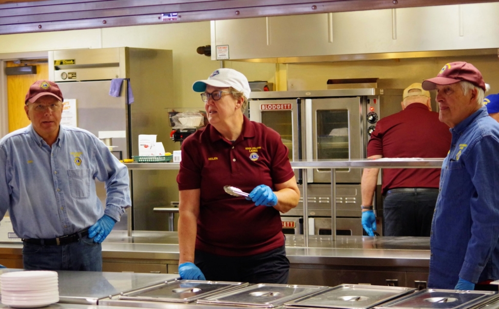 Eden Prairie Lions Club members (from left) Joel Johnson, Helen Laleman, and Richard Klatte help serve food at last year’s Pancake Breakfast. Photos courtesy of the Eden Prairie Lions Club