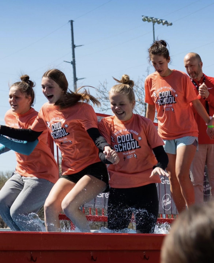 Like the 2023 event shown here, this year's Polar Plunge at EPHS will take place in a large cargo container of water. Photo courtesy of Key Club officers