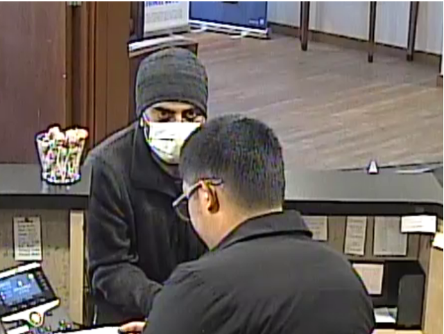 Surveillance image of the suspect during the March 28 robbery at Old National Bank in Eden Prairie, later identified as Zahir Mohamednazir Bachelani. Source: Eden Prairie police