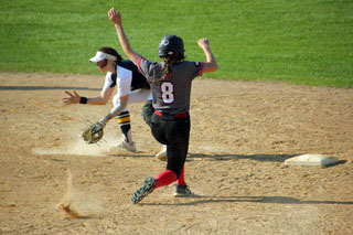 Eden Prairie's Genevieve Street prepared to slide into second as the Rosemount shortstopl waited for a throw to arrive. The Eagles beat the Irish 6-4 Tuesday afternoon in Rosemount. Photo by Laura Neuman