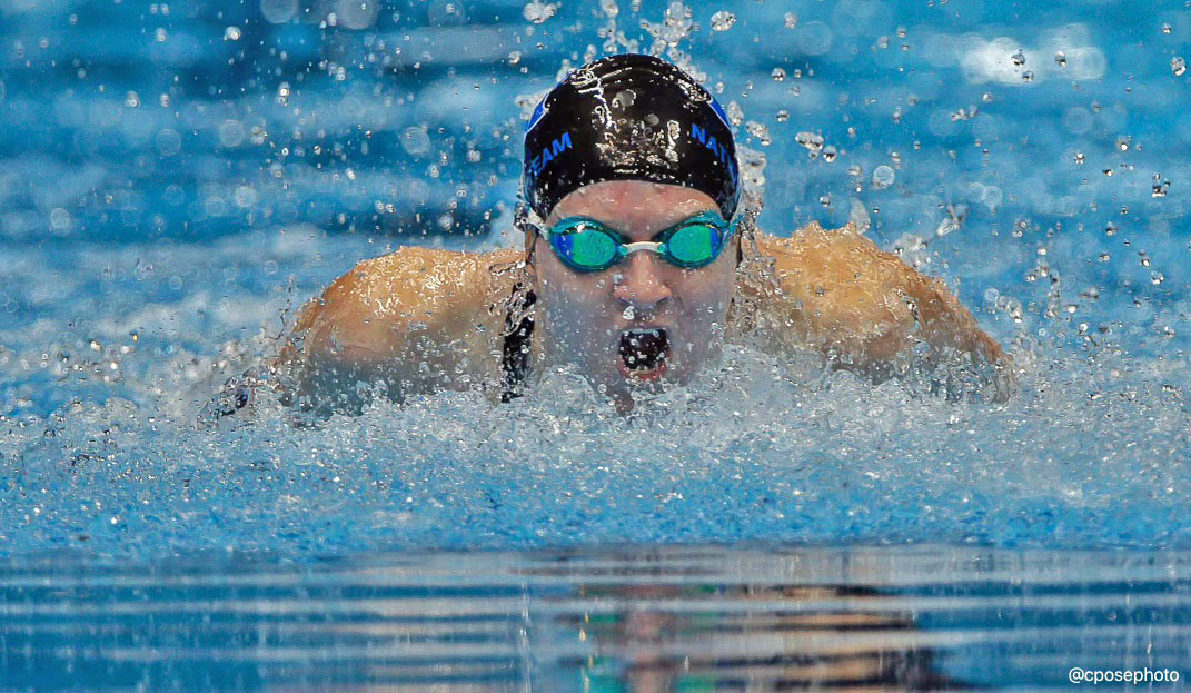 Caroline Larsen in the opening 50 meters of the 100 Fly event at the U.S. Olympic swimming trials in Indianapolis, IN. Photo by Chris Pose June 2024