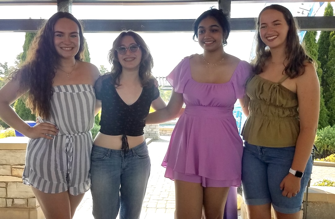 The top performers from last year's competition (from left): Lainey Donaghue (first place), Sadie Maguire (second place), and runner-ups Navya Nambiar and Ella Schumacher. Photo courtesy of the Eden Prairie Optimist Club