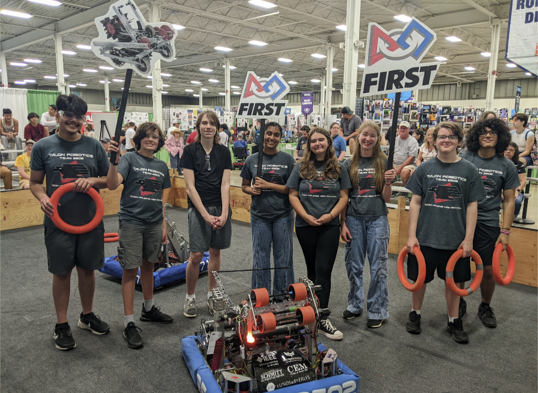 The EPHS Talon Robotics team demonstrated and presented their robot at the 2024 Minnesota State Fair. Team members, left to right, include Rishi Jaiswal, Will Archambault, Riley Lamothe, Medha Ganjam, Charlotte Shivery, Ally Lamothe, Dylan Dreher, and Gabriel Brandt. Submitted photo