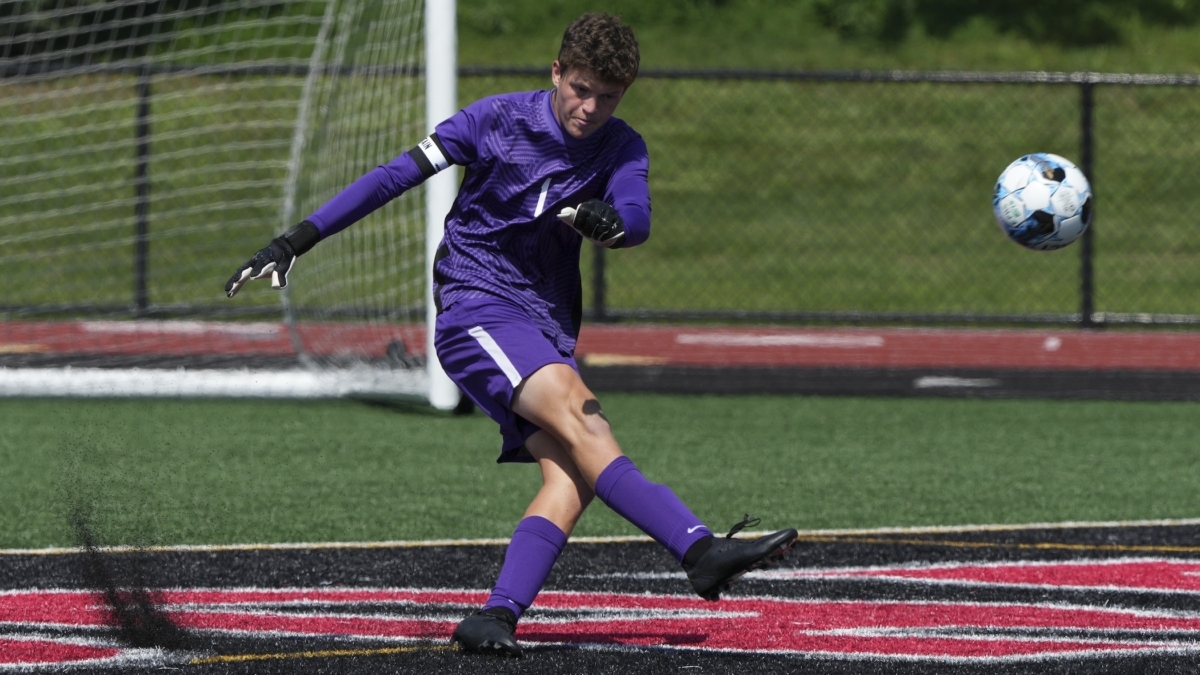 Eden Prairie senior captain and goalkeeper Nathan Louwagie clears the ball during Saturday’s match. Photo by Rick Olson