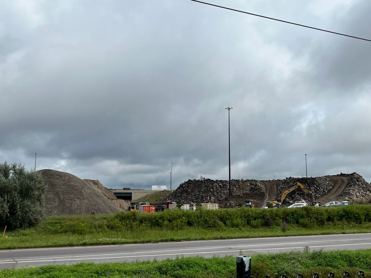 The concrete piles and construction equipment amassed along the southwest corner of the I-494 and Highway 212 interchange have sparked curiosity. Photo by Joanna Werch Takes
