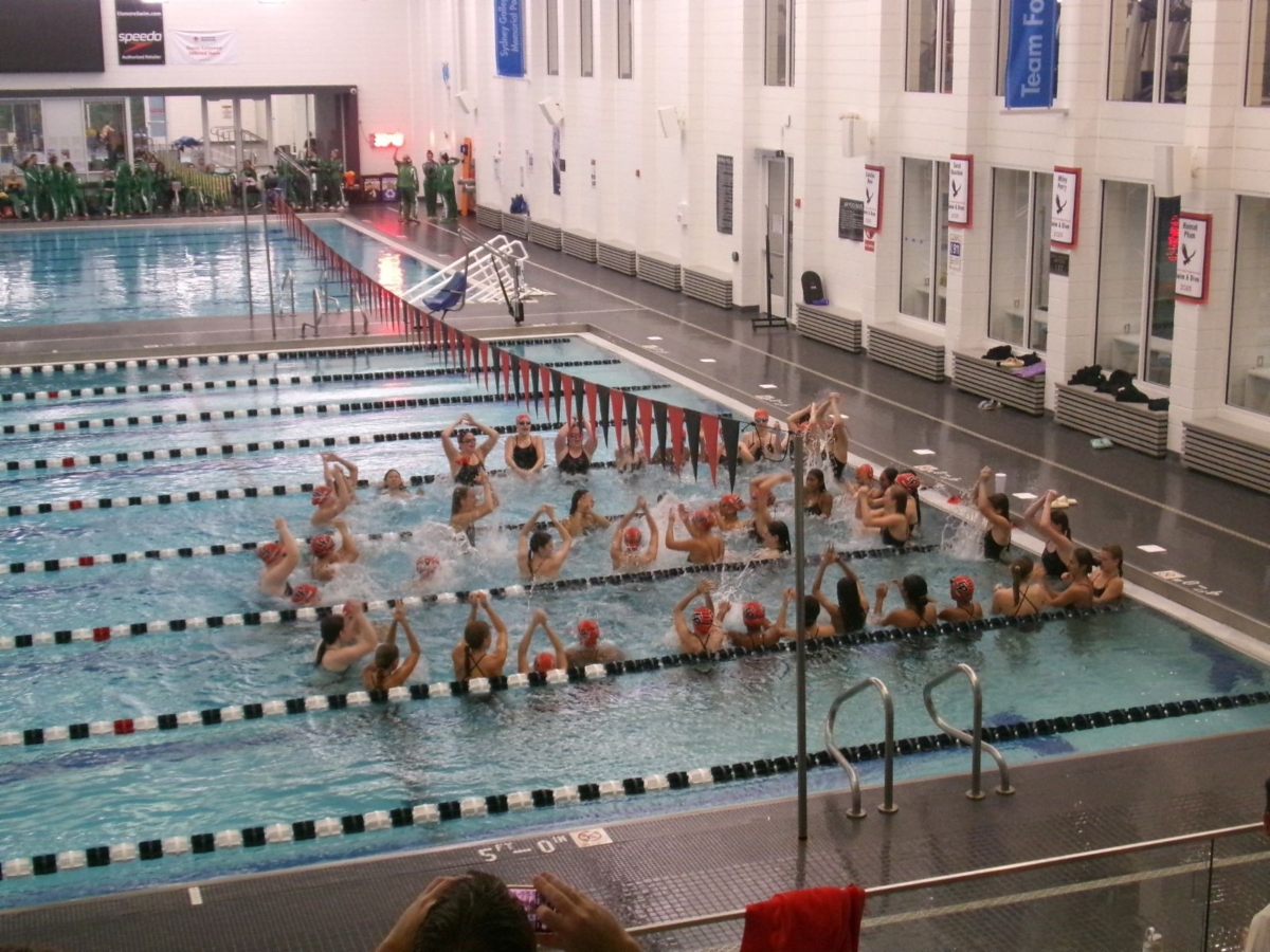 The EPHS girls swim and dive team participates in the E-A-G-L-E-S cheer before their first meet. Submitted photo by Amma Osei