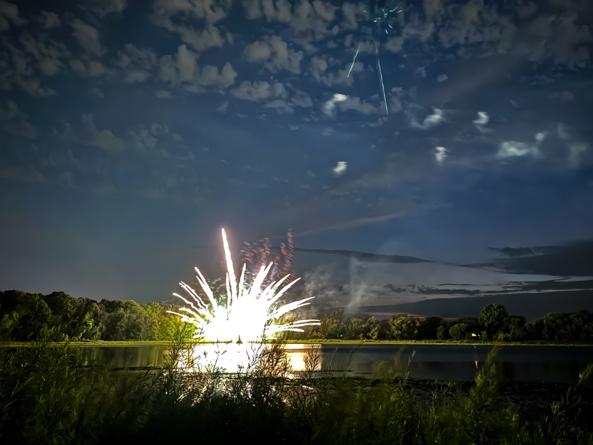 Fireworks explode near the ground in an apparent malfunction at Round Lake Park. Photo by Gretchen Haynes