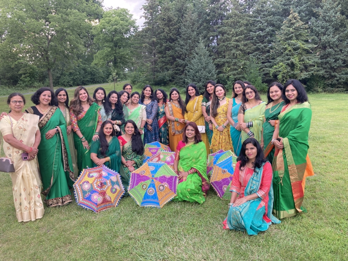 A group of Eden Prairie women gathered at Riley Lake Park earlier this month to celebrate Hariyali Teej, a Hindu festival special to married women. Photo by Steve Schewe
