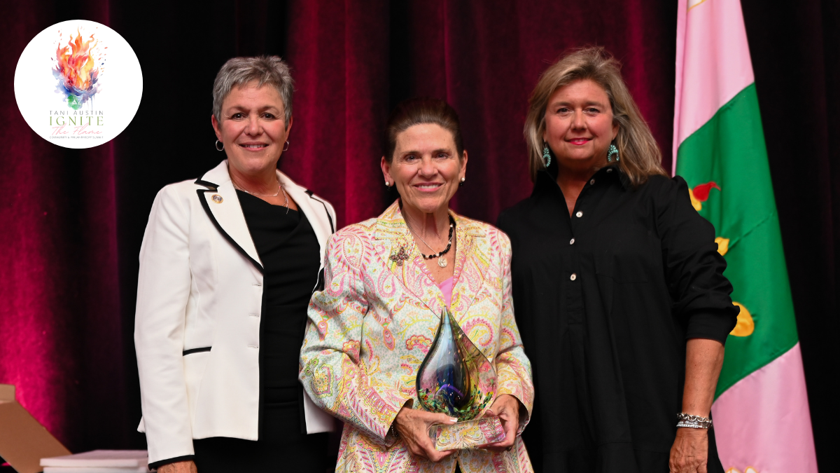 Tani Austin, center, receives her award from Delta Zeta Sorority Chief Executive Officer Cindy Menges, left, and Delta Zeta National President Cathy Painter, right. Submitted photo