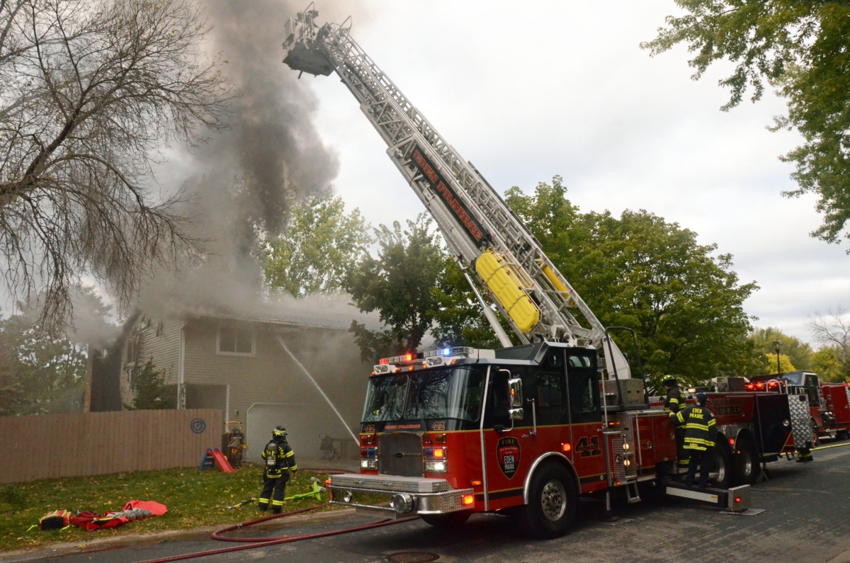 Eden Prairie firefighters battled a multi-alarm fire at 7340 Bagpipe Sunday morning Oct. 6. Firefighters from Bloomington, Minnetonka, Hopkins and Excelsior were among those who responded to the scene. Photo by Jim Bayer