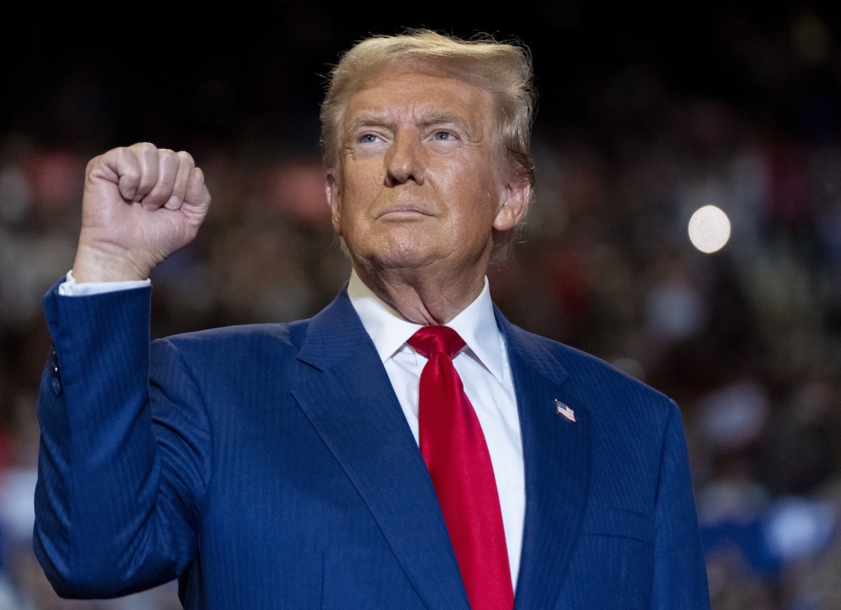 Republican presidential nominee former President Donald Trump pumps his fist as he arrives to speak at a campaign event at Nassau Coliseum, Wednesday, Sept.18, 2024, in Uniondale, N.Y. (AP Photo/Alex Brandon)