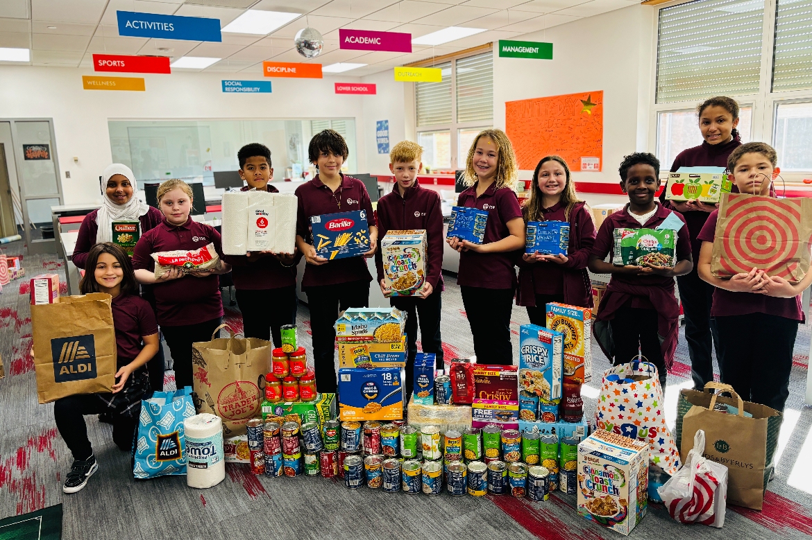 ISM students with some of the food and necessities they collected for PROP. Contributed photo