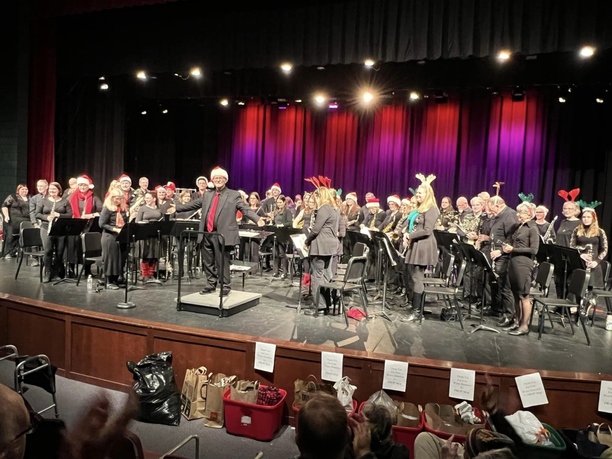 Eden Prairie Community Band director Tom Muehlbauer and band members are shown at the 2023 “Share the Warmth” concert. Submitted photo