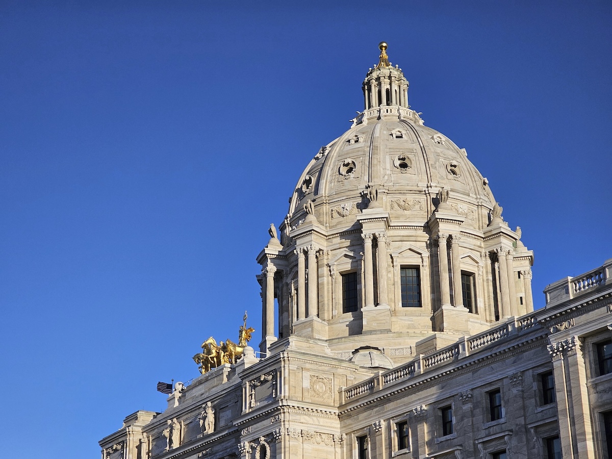 FILE - Morning light strikes the Minnesota State Capitol in St. Paul on Wednesday, March 20, 2024. (AP Photo/Steve Karnowski, File)