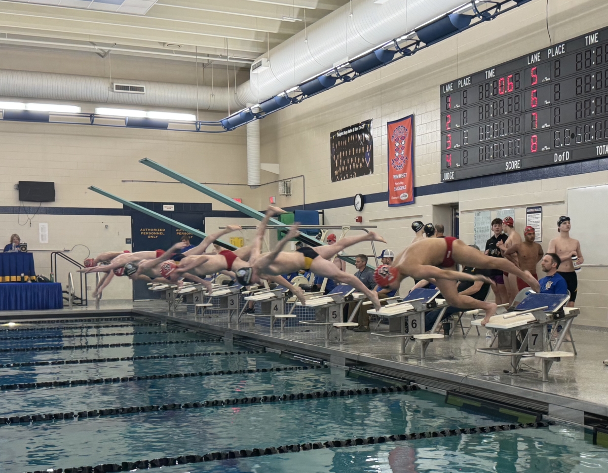 Eagles swimmers, from left, Finn Aaberg, Jack Kevan, Vincent Schulze, and Huijae Kim, compete in the 100 free at STMA. Photo by Juliana Allen 