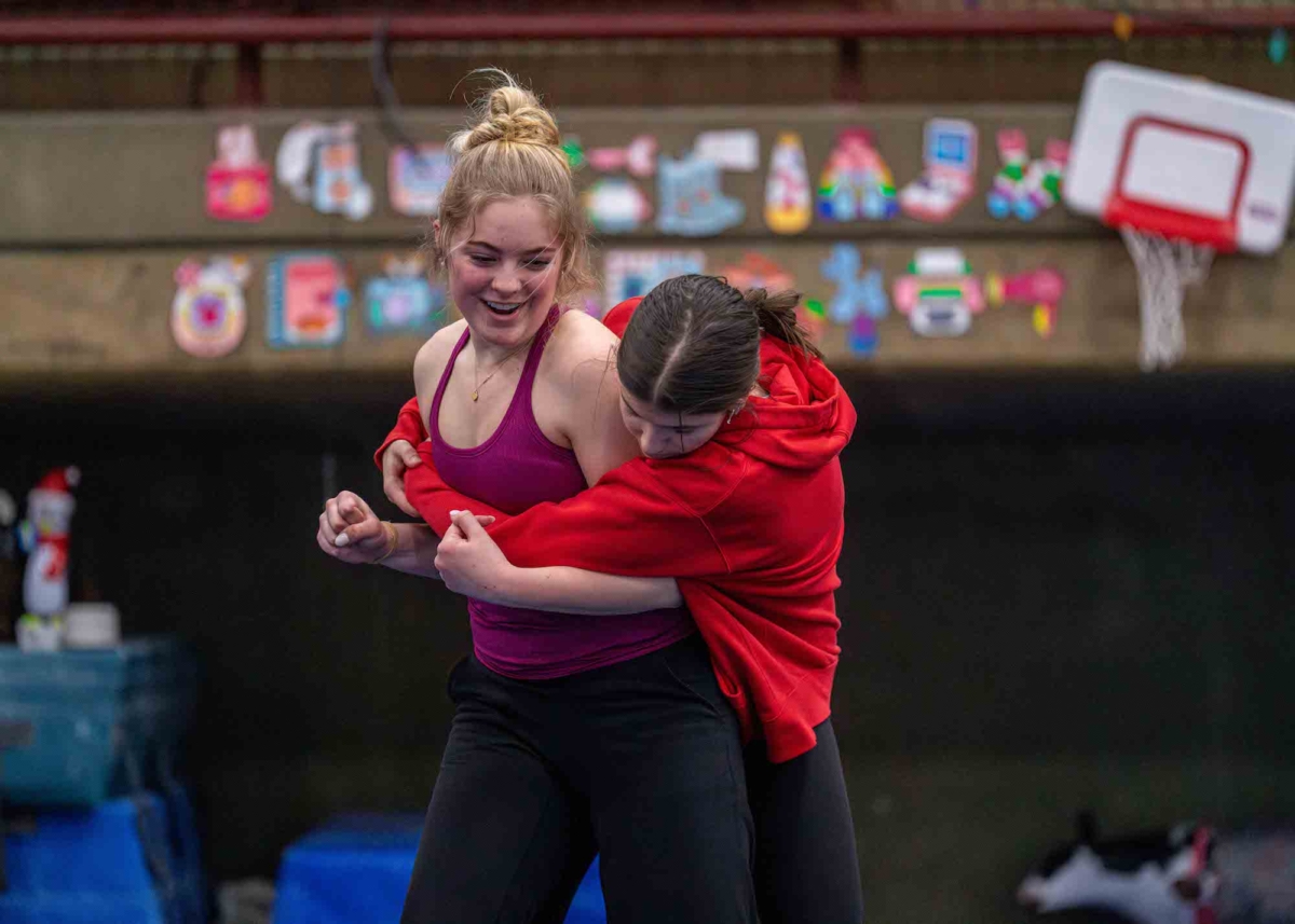 Celia Skubic (left) and Chloe Kruse practice self-defense exercises. Photo by Hayden Koughan