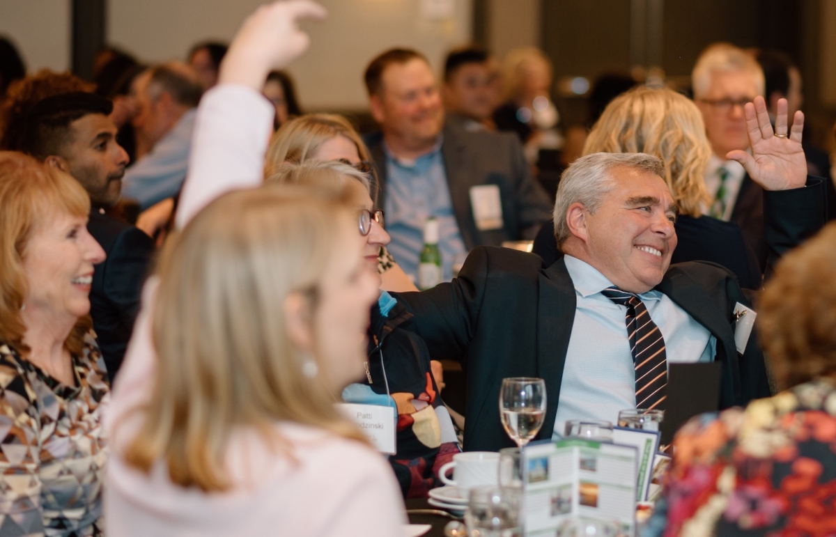 State Sen. Steve Cwodzinski (DFL-49, Eden Prairie) sits with other attendees at the 2024 EP Gives gala. He will return as emcee for this year’s event on May 1. Courtesy photo