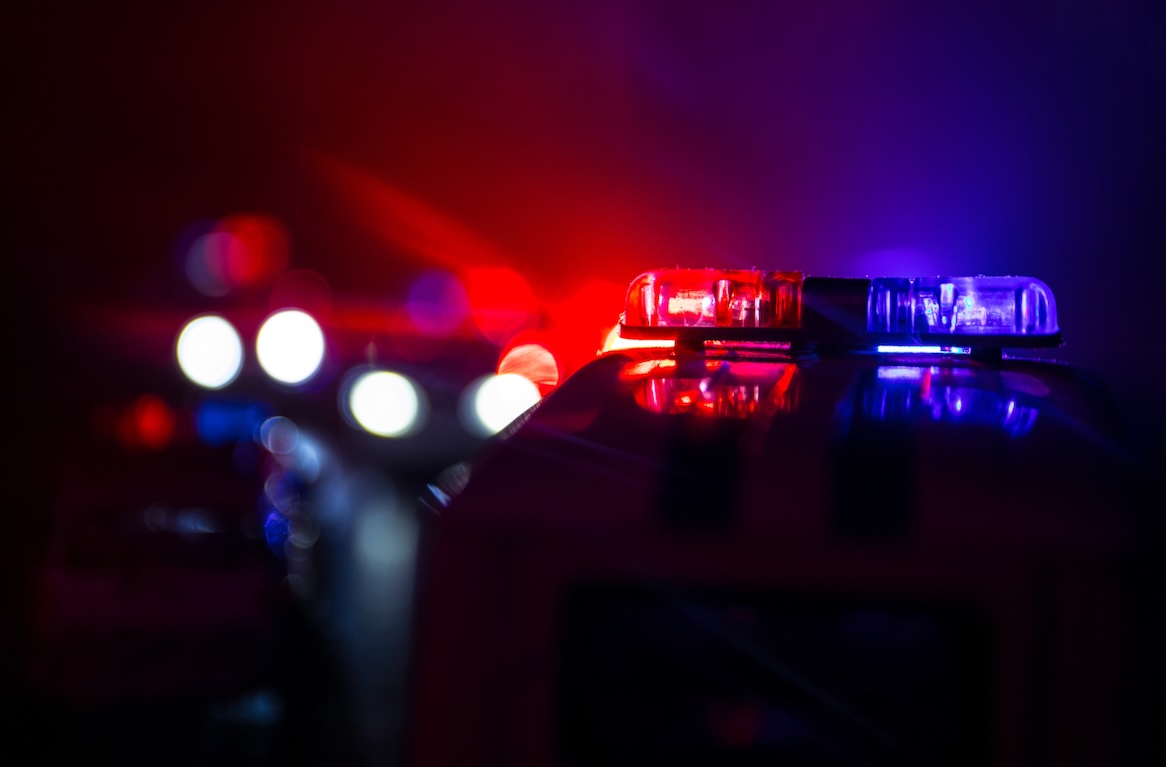 police sirens light up the night