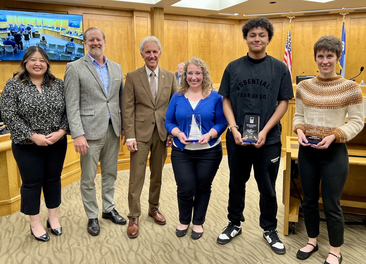 From left, Community Services Manager Paja Xiong; Human Rights and Diversity Commission Chair Greg Leeper; Mayor Ron Case; and 2024 Human Rights Award recipients Rachel Casper, Naim Umar, and Kelsey Whitcomb of Mission Animal Hospital at the May 20 Eden Prairie City Council meeting.
