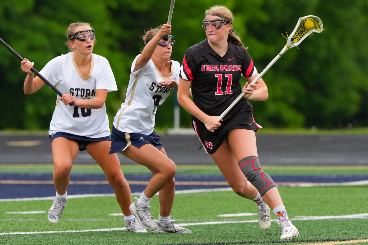 Eden Prairie junior attacker Sara David drives to the net to score her fourth goal, giving the Eagles an 11-9 lead against the Storm with 5:43 left in the fourth quarter of Thursday’s Section 2A quarterfinal at Chanhassen High School.