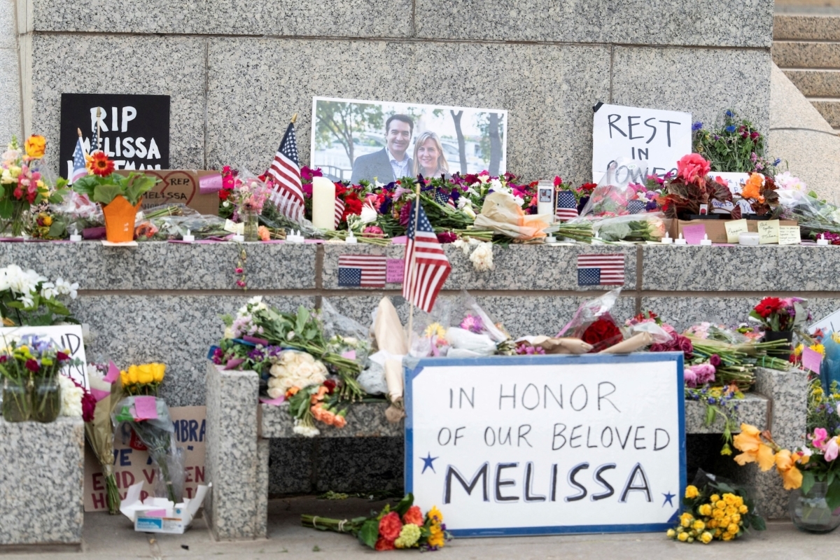 Flowers and handwritten messages sit at a memorial outside the Minnesota State Capitol in honor of Democratic state Rep. Melissa Hortman and her husband, Mark, after a gunman killed them, in St. Paul, on June 15.(REUTERS/Tim Evans)