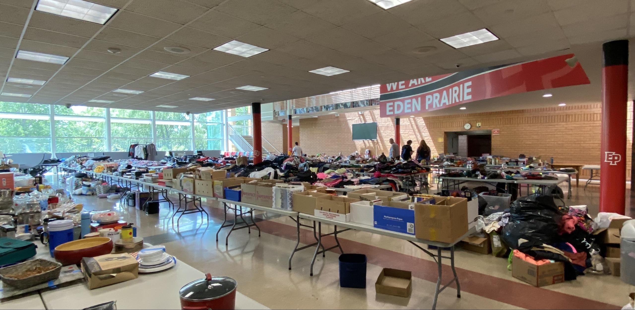 room with many things set out for sale on tables