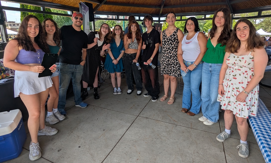 Participants and organizers at the ninth annual Eden Prairie Sings! competition on Aug. 16. From left: Lainey Donoghue (2023 winner), Miriam Gilbertson (2024 winner), emcee Ryan Affolter of the Eden Prairie Optimist Club, Selah Harmon, Sadie Maguire (second place), Sophia Repice (first place), Hudson Repice, Annabelle Engesser, Grace Hunter (honorable mention), Charlee Jones and Hannah Barisonzi. Not pictured: Lilianna Rindal (third place). Photo by Karla Wennerstrom
