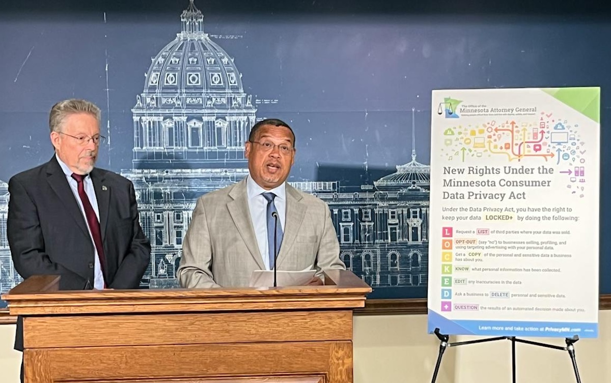 Minnesota Attorney General Keith Ellison, right, and state Rep. Steve Elkins, DFL-Bloomington, speak about the Minnesota Consumer Data Privacy Act during a news conference on July 28, 2025. (Bill Lukitsch/Star Tribune via ZUMA Press Wire)
